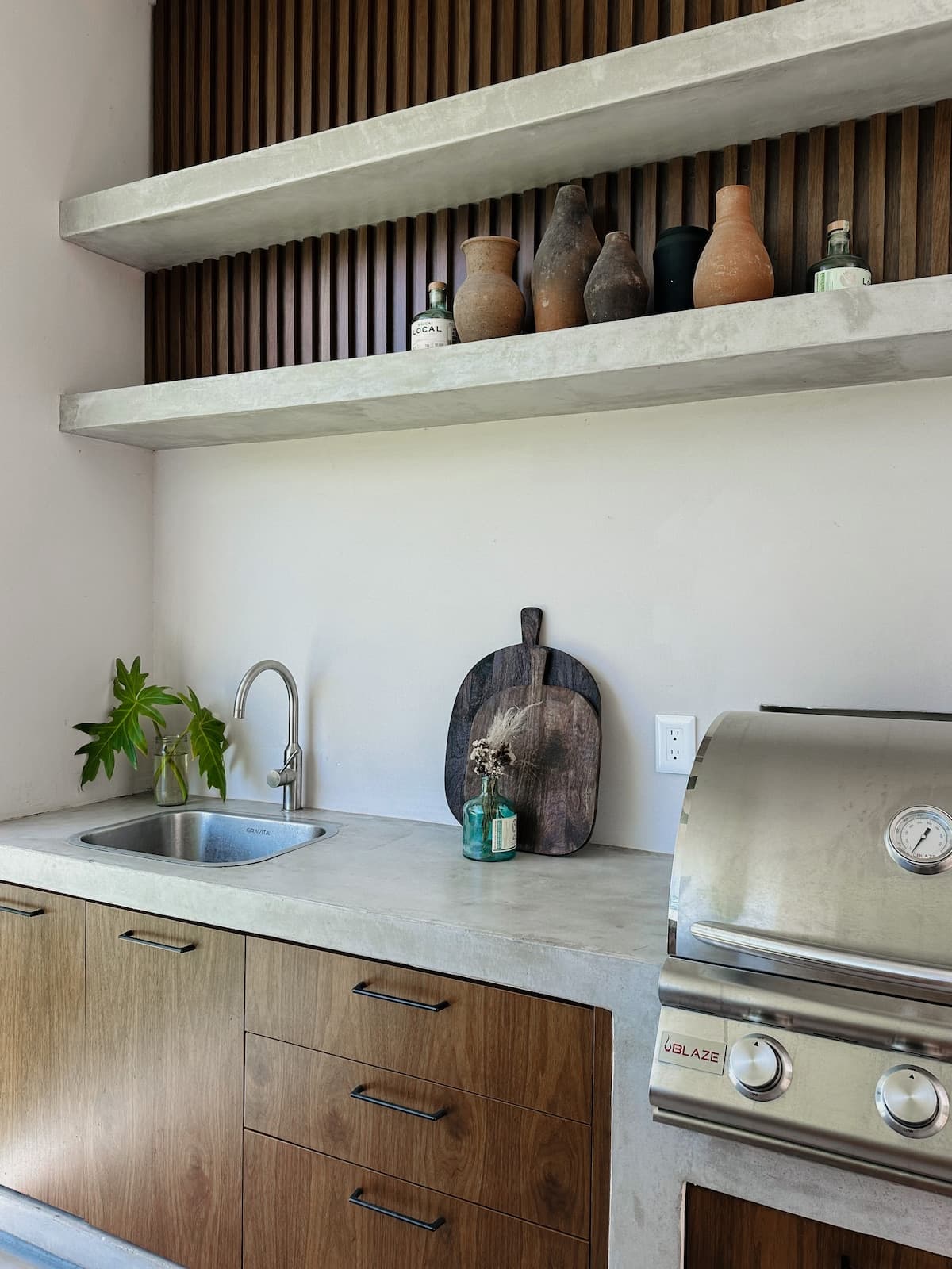 Barbecue with sink and bar area